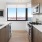 a kitchen with a large window