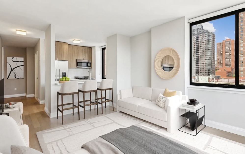 living room and kitchen with natural light