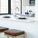 a kitchen with a table and chairs