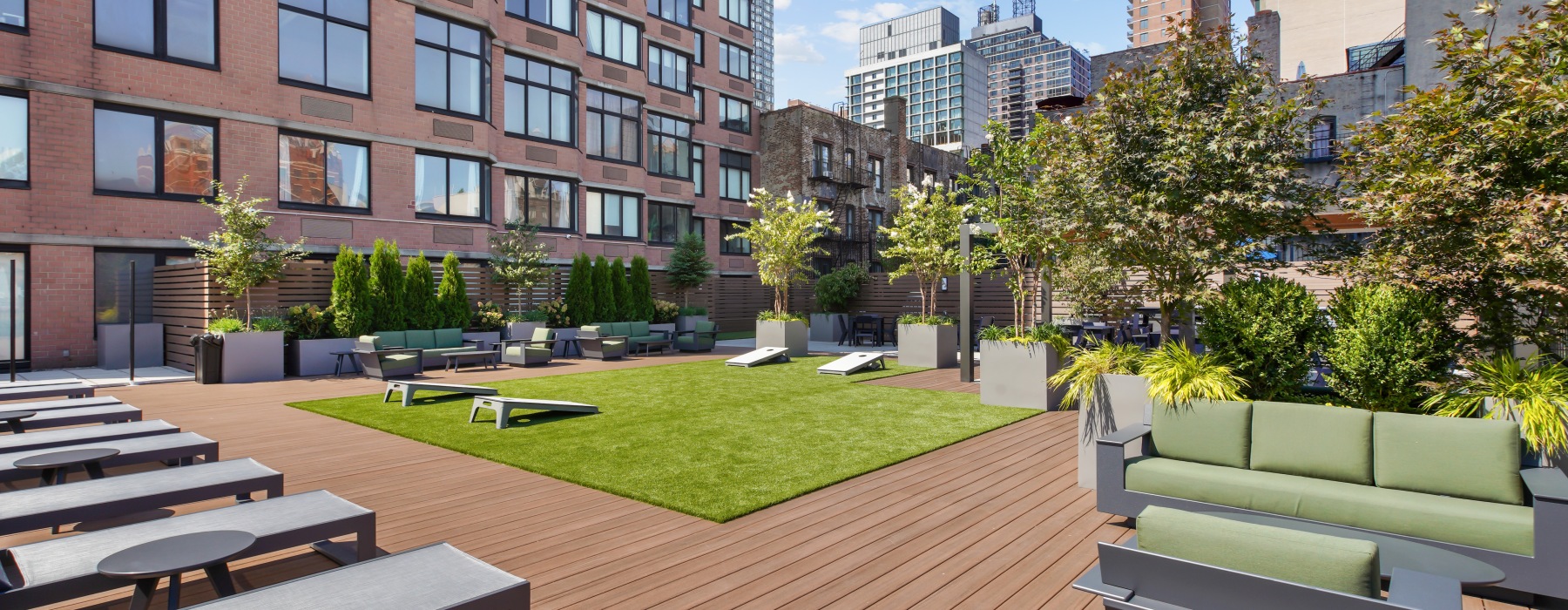 Terrace with turf and lawn games.